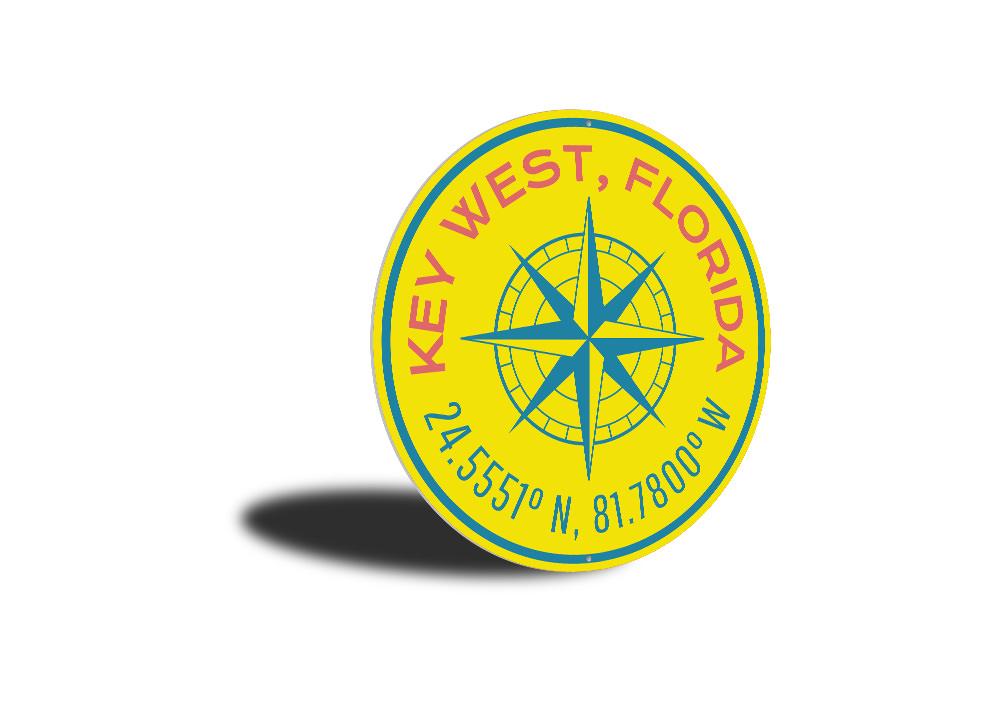 Key West Compass Sign featuring nautical design, made from high-quality aluminum, perfect for coastal decor.