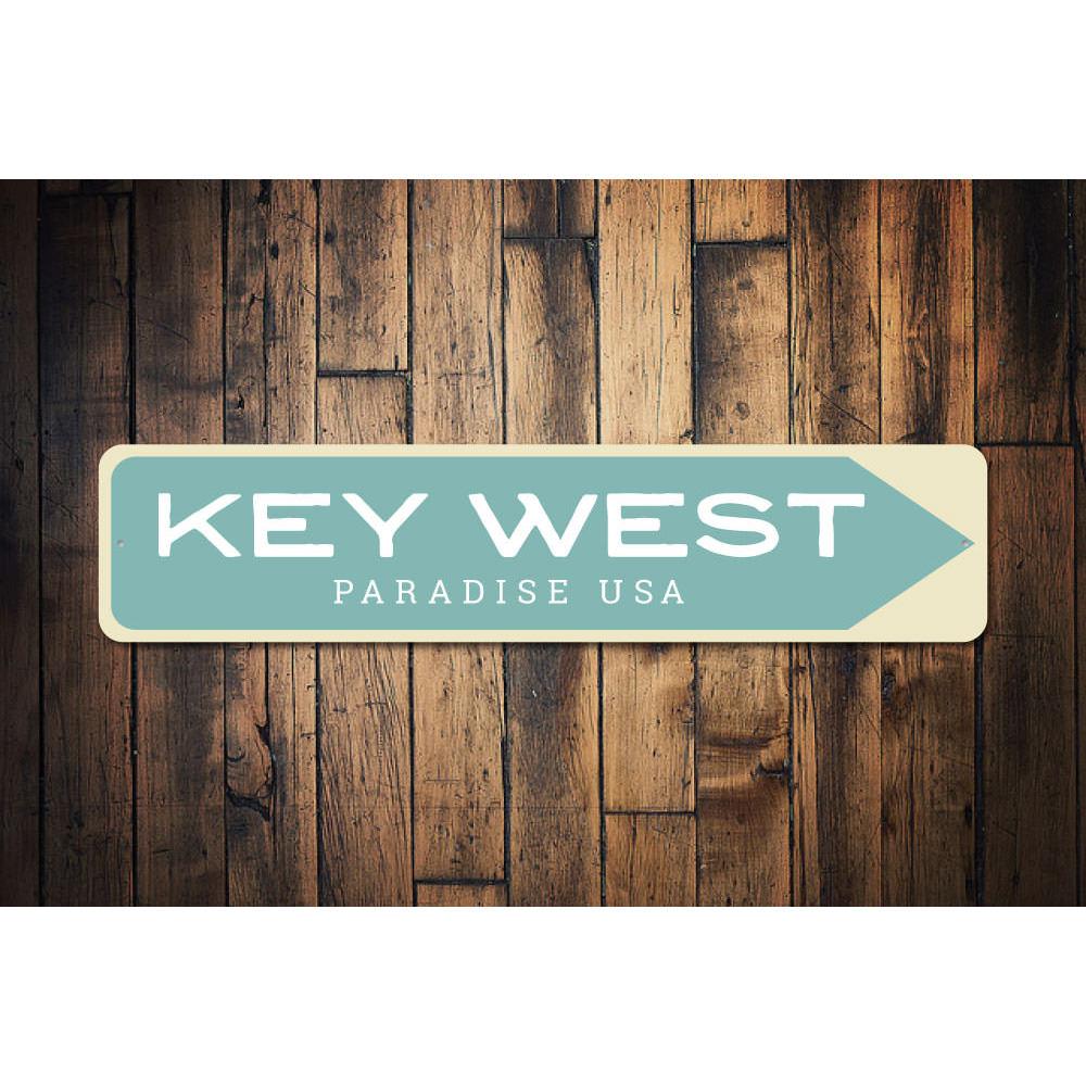 A beautifully crafted Key West Sign made of aluminum, featuring customizable text and a coastal design, perfect for beach-themed decor.