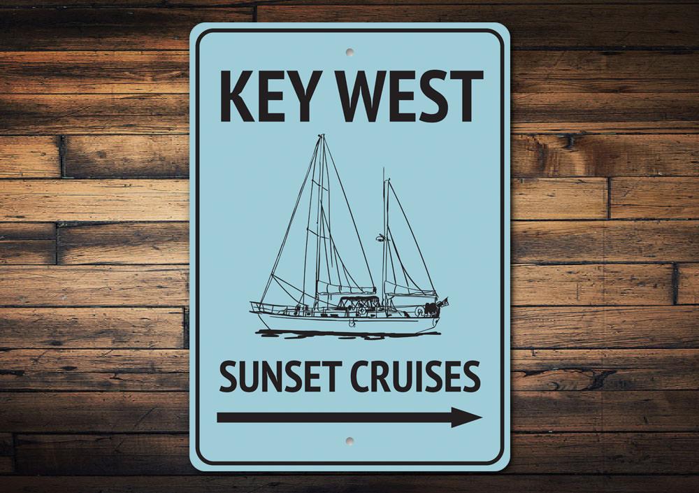 Key West Sunset Cruises decorative metal sign showcasing vibrant colors and coastal design, perfect for beach-themed decor.