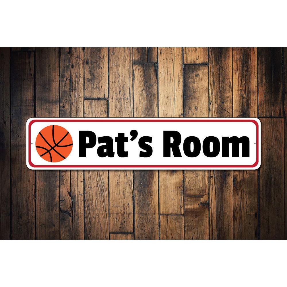 A colorful Kids Basketball Sign featuring a basketball design, customizable text, and pre-drilled holes for easy mounting, made from durable aluminum.