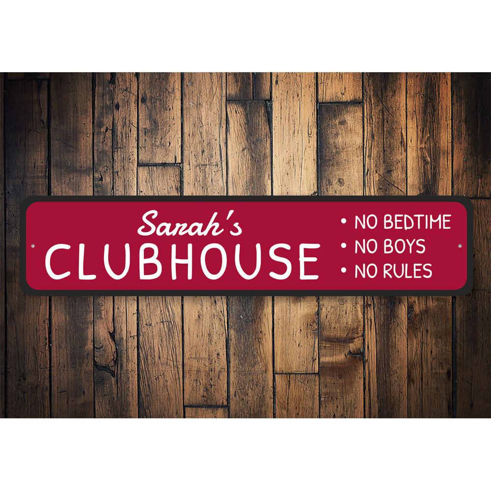 Red clubhouse sign on wood.