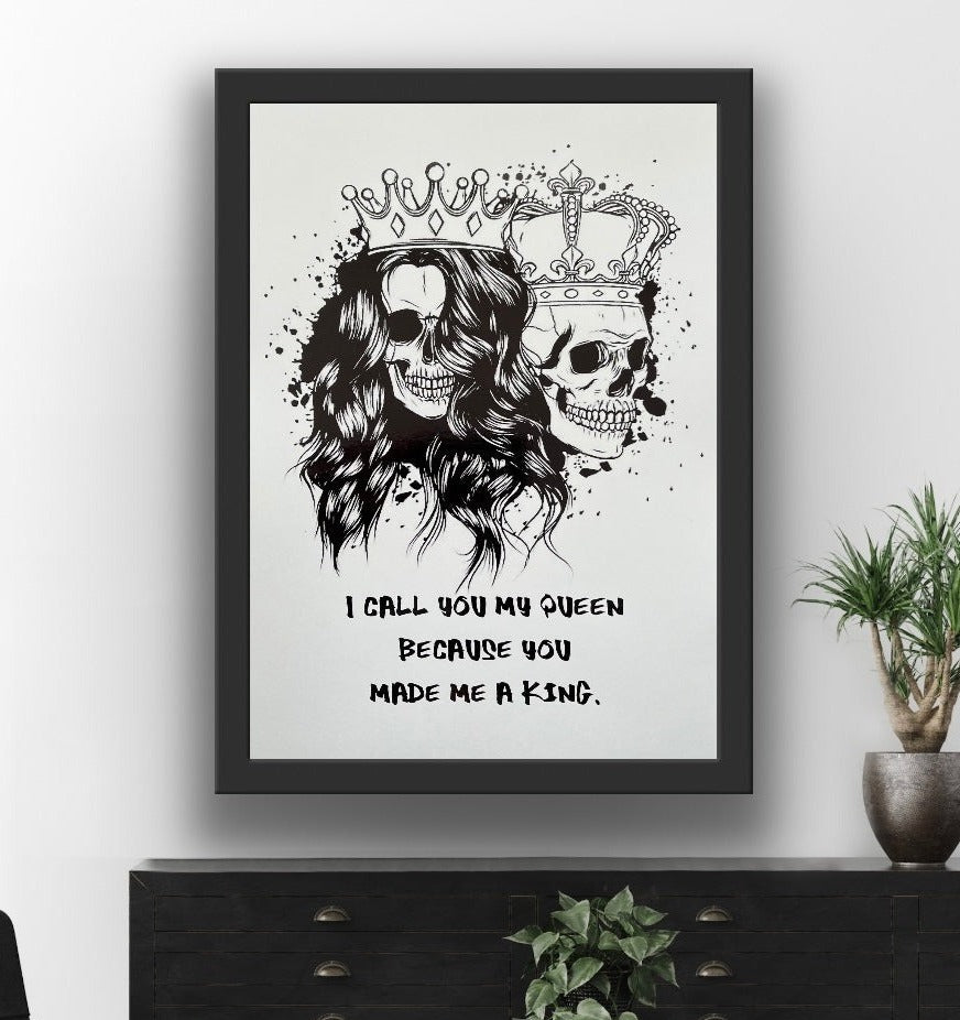 King & Queen Skull Foil Print featuring male and female skulls with crowns, showcasing intricate black foil details.