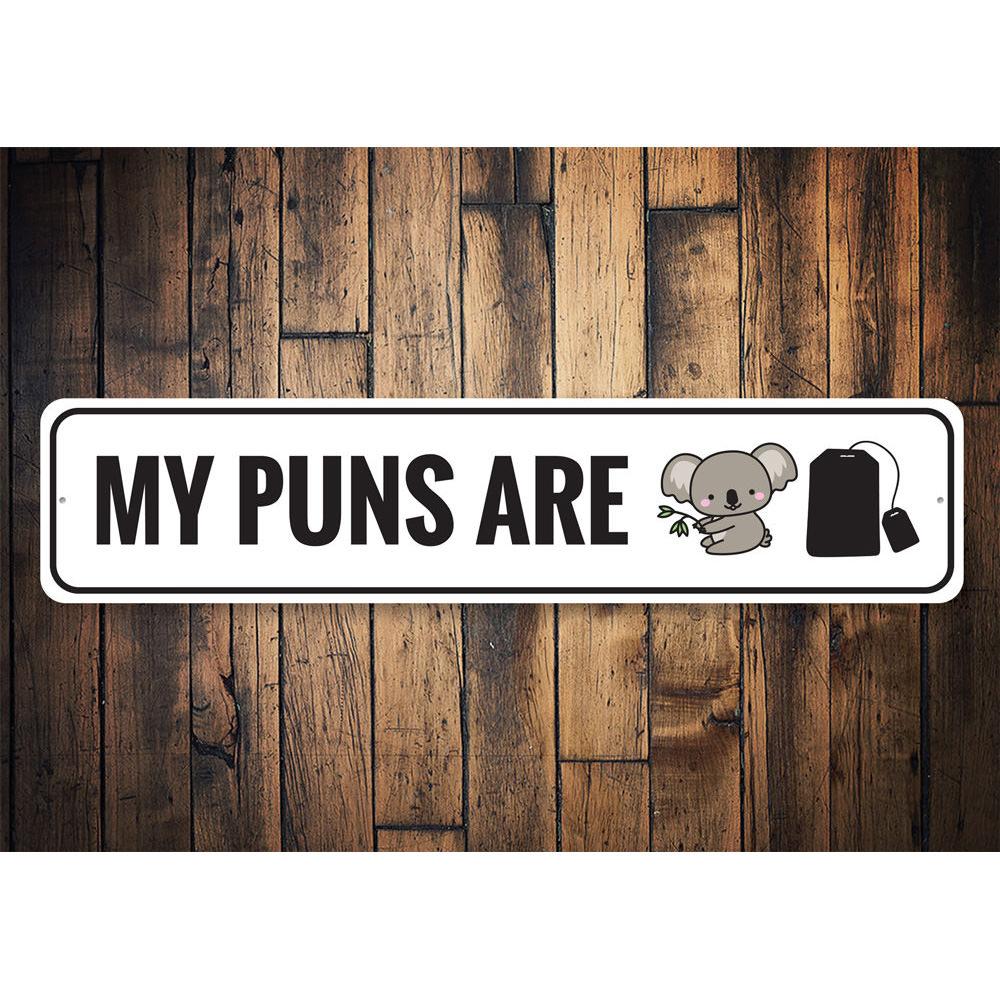 A humorous Koala Tea Pun Sign made of aluminum, featuring a cute koala and playful text, perfect for home decor.