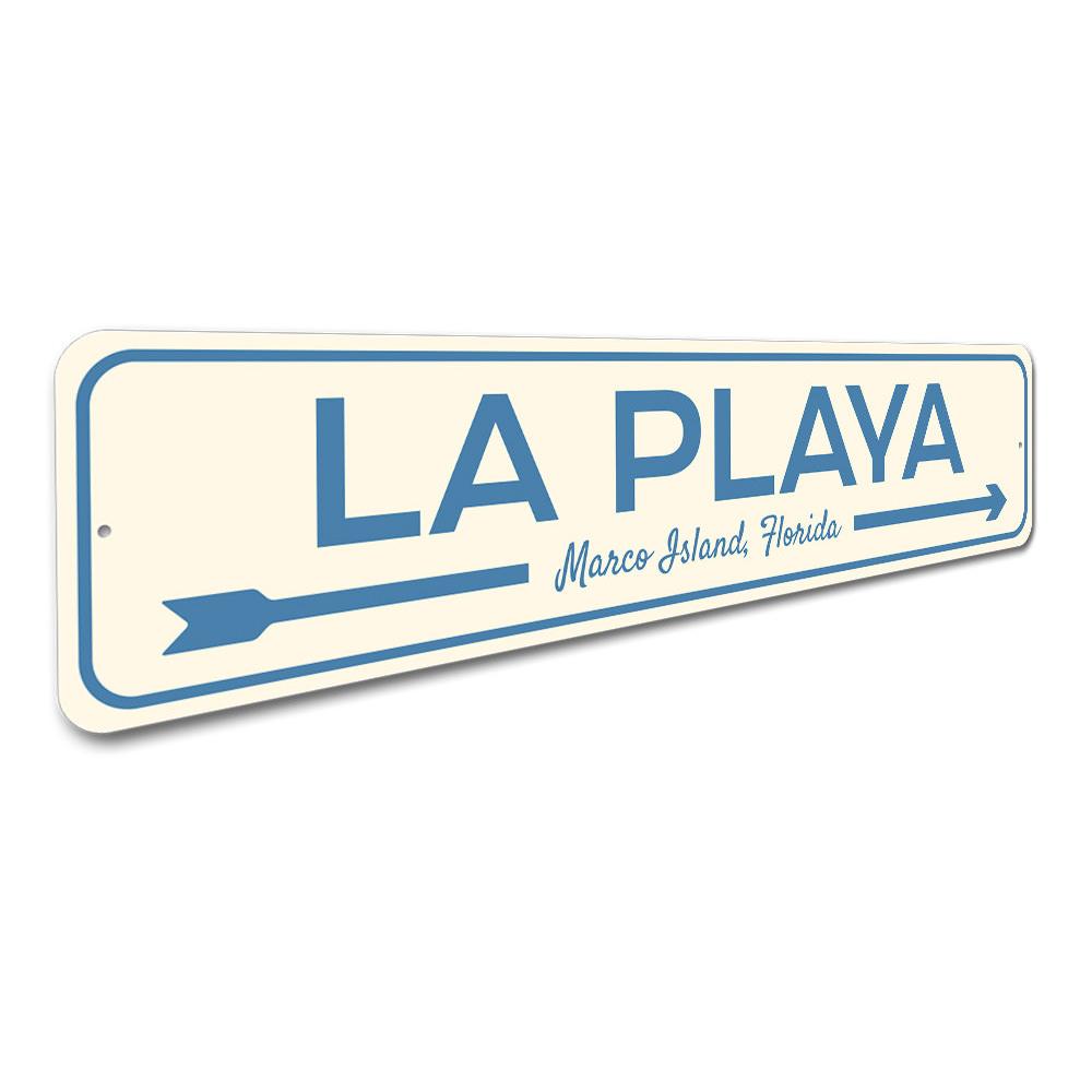 La Playa Beach Sign made of durable aluminum, featuring vibrant colors and a coastal design, perfect for home decor.