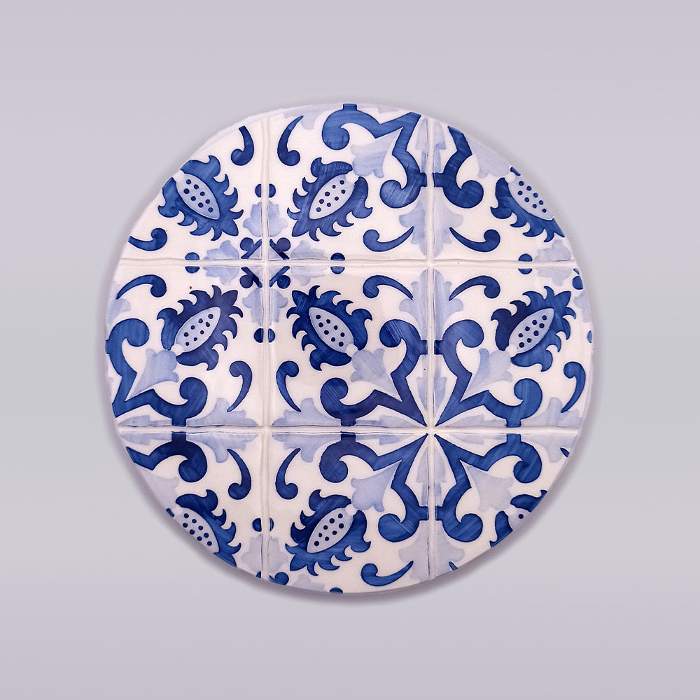 Lagos Ceramic Hot Plate Trivet featuring hand-painted designs and durable ceramic material, perfect for kitchen use.