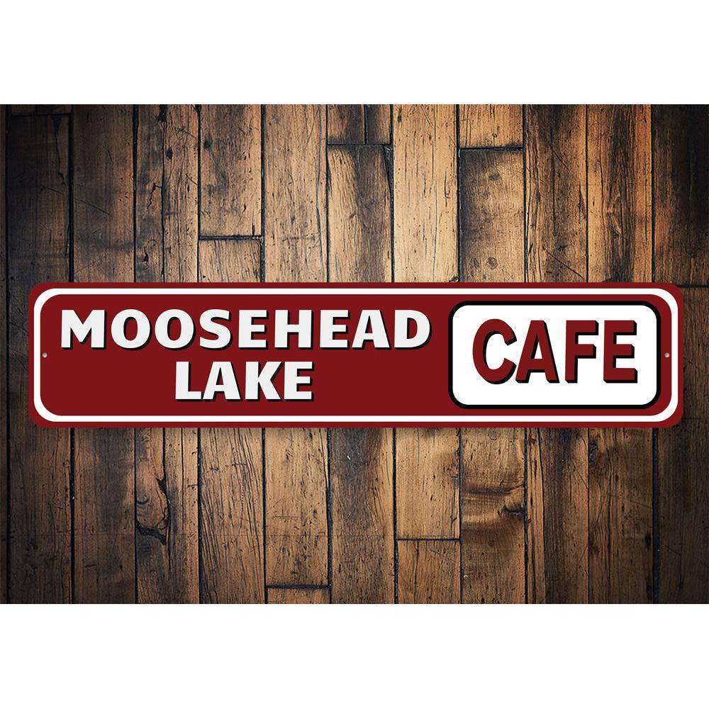 A beautifully crafted Lake Cafe Sign made of durable aluminum, showcasing a lakeside theme with customizable text options.