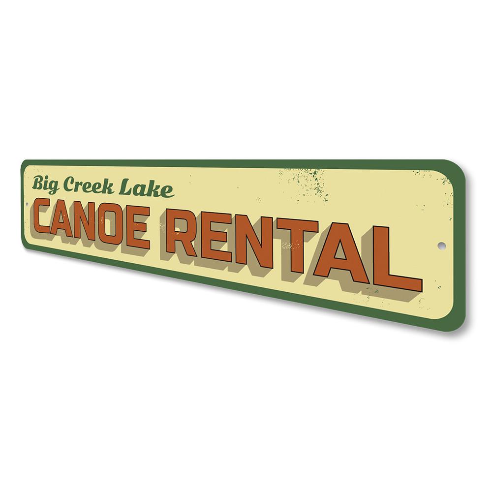 A decorative Lake Canoe Rental Sign made of high-quality aluminum, featuring customizable text and pre-drilled holes for easy mounting.