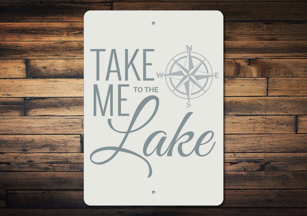 A beautifully crafted Lake Compass Sign made of high-quality aluminum, showcasing a compass design perfect for lakehouse decor.