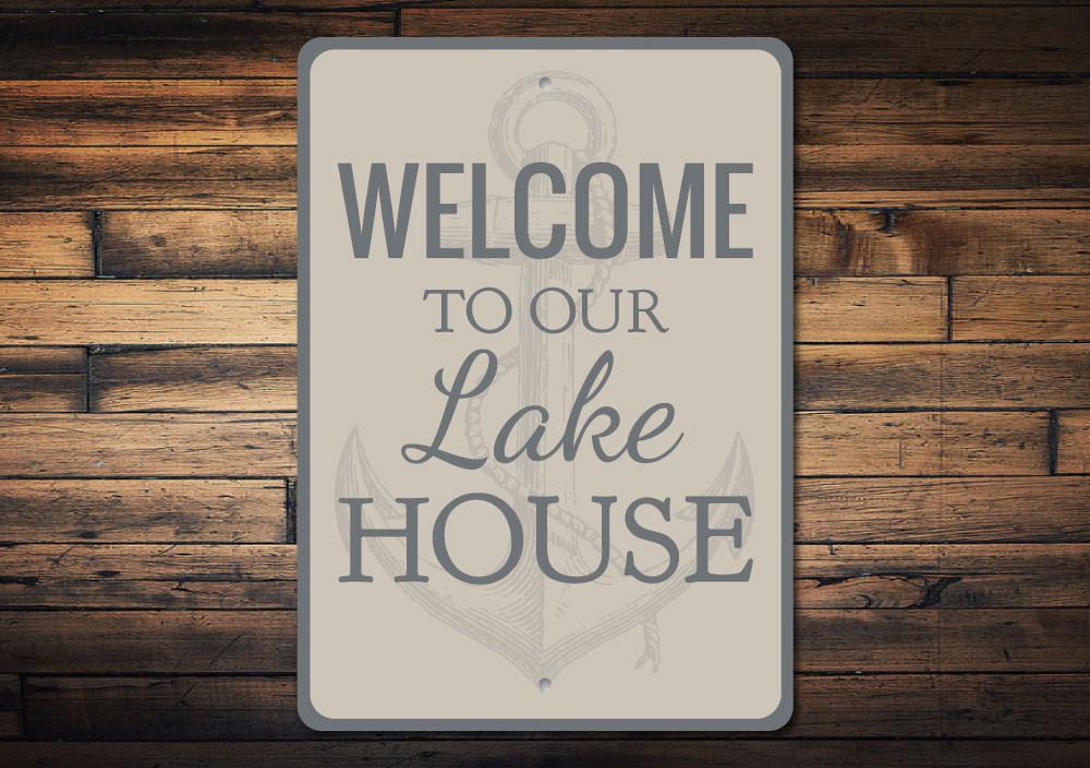 A beautifully crafted Lake House Anchor Sign made of durable aluminum, featuring a nautical design perfect for lake house decor.