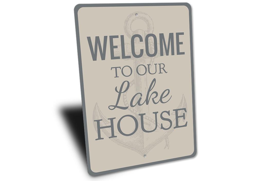 A beautifully crafted Lake House Anchor Sign made of durable aluminum, featuring a nautical design perfect for lake house decor.