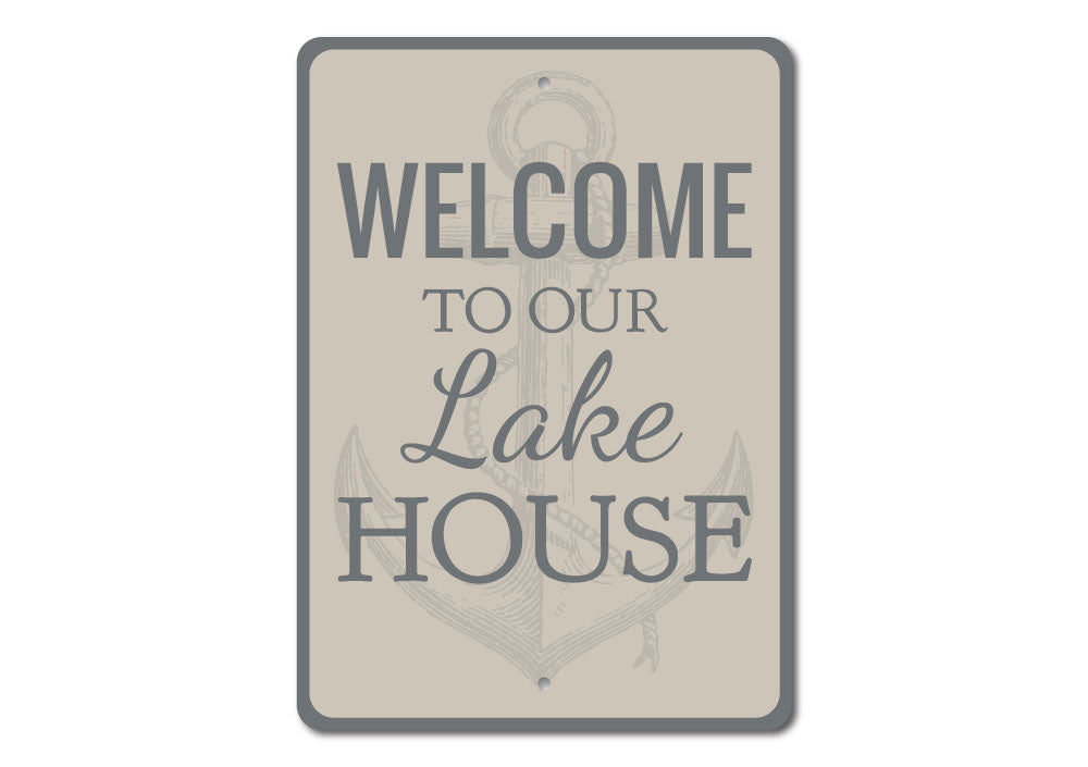 A beautifully crafted Lake House Anchor Sign made of durable aluminum, featuring a nautical design perfect for lake house decor.