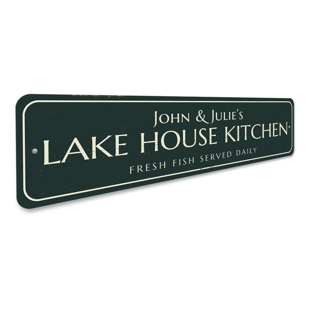 A beautifully crafted Lake House Kitchen Sign made of premium aluminum, featuring customizable text and a charming lake-themed design.