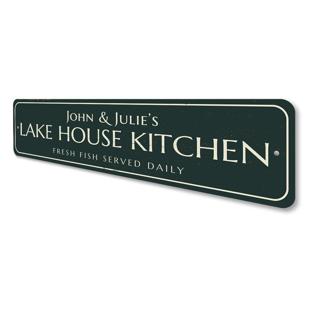 A beautifully crafted Lake House Kitchen Sign made of premium aluminum, featuring customizable text and a charming lake-themed design.