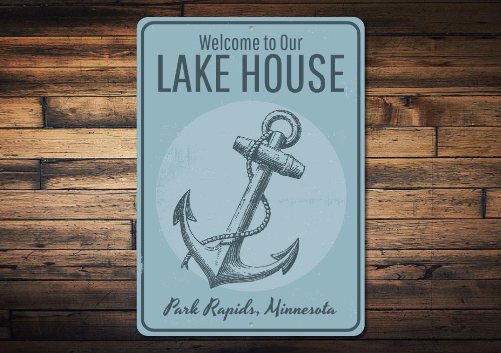 Lake House Welcome Anchor Sign made of durable aluminum, featuring a nautical anchor design, perfect for lake house decor.