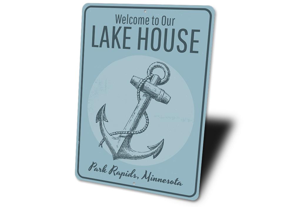 Lake House Welcome Anchor Sign made of durable aluminum, featuring a nautical anchor design, perfect for lake house decor.