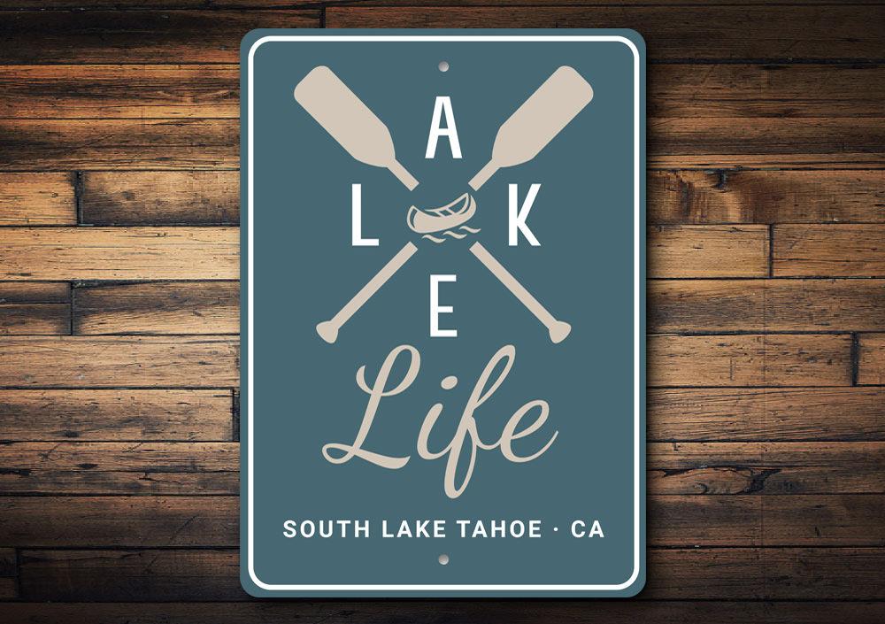 A beautifully crafted Lake Life Sign made of aluminum, showcasing a serene lakeside theme, perfect for home decor.