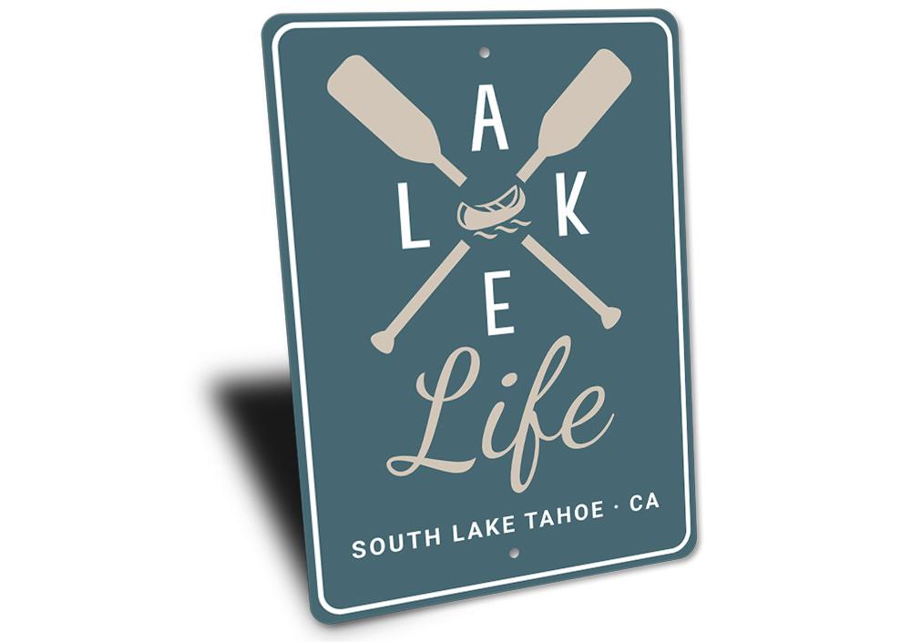 A beautifully crafted Lake Life Sign made of aluminum, showcasing a serene lakeside theme, perfect for home decor.