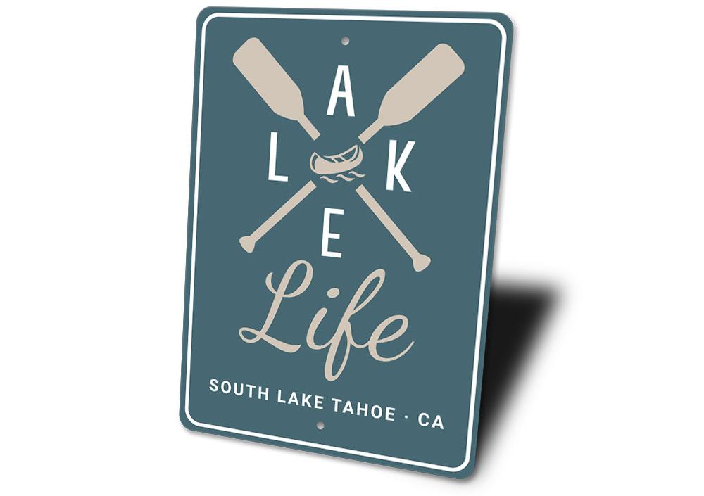 A beautifully crafted Lake Life Sign made of aluminum, showcasing a serene lakeside theme, perfect for home decor.