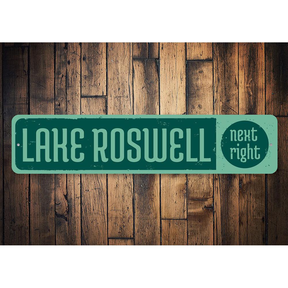 A decorative Lake Next Right Sign made of high-quality aluminum, featuring customizable text and pre-drilled holes for easy mounting.