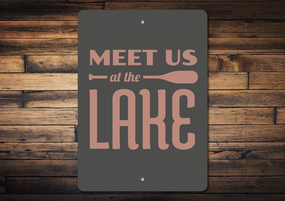 A beautifully crafted Lake Oar Sign made of high-quality aluminum, featuring customizable text and a rustic design, perfect for lakehouse decor.