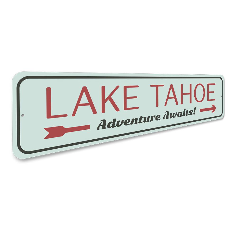 A beautiful Lake Tahoe Awaits Sign made of high-quality aluminum, showcasing a scenic lake design, perfect for home decor.