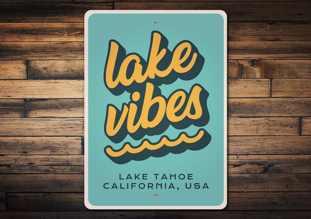 A beautiful Lake Vibes Sign made of durable aluminum, featuring customizable text, perfect for lakehouse decor.