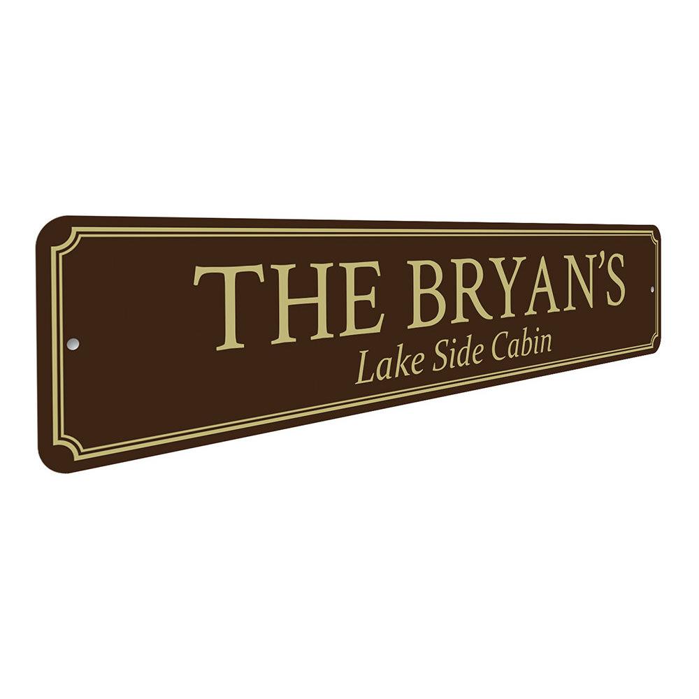 A beautifully crafted aluminum Lakeside Cabin Sign featuring customizable text, perfect for lakehouse decor.