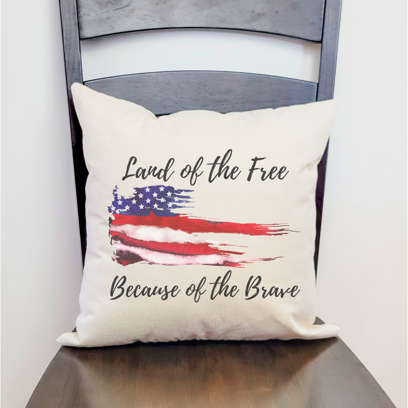 Land of the Free Pillow Cover featuring a patriotic design on soft beige linen fabric with a hidden zipper.