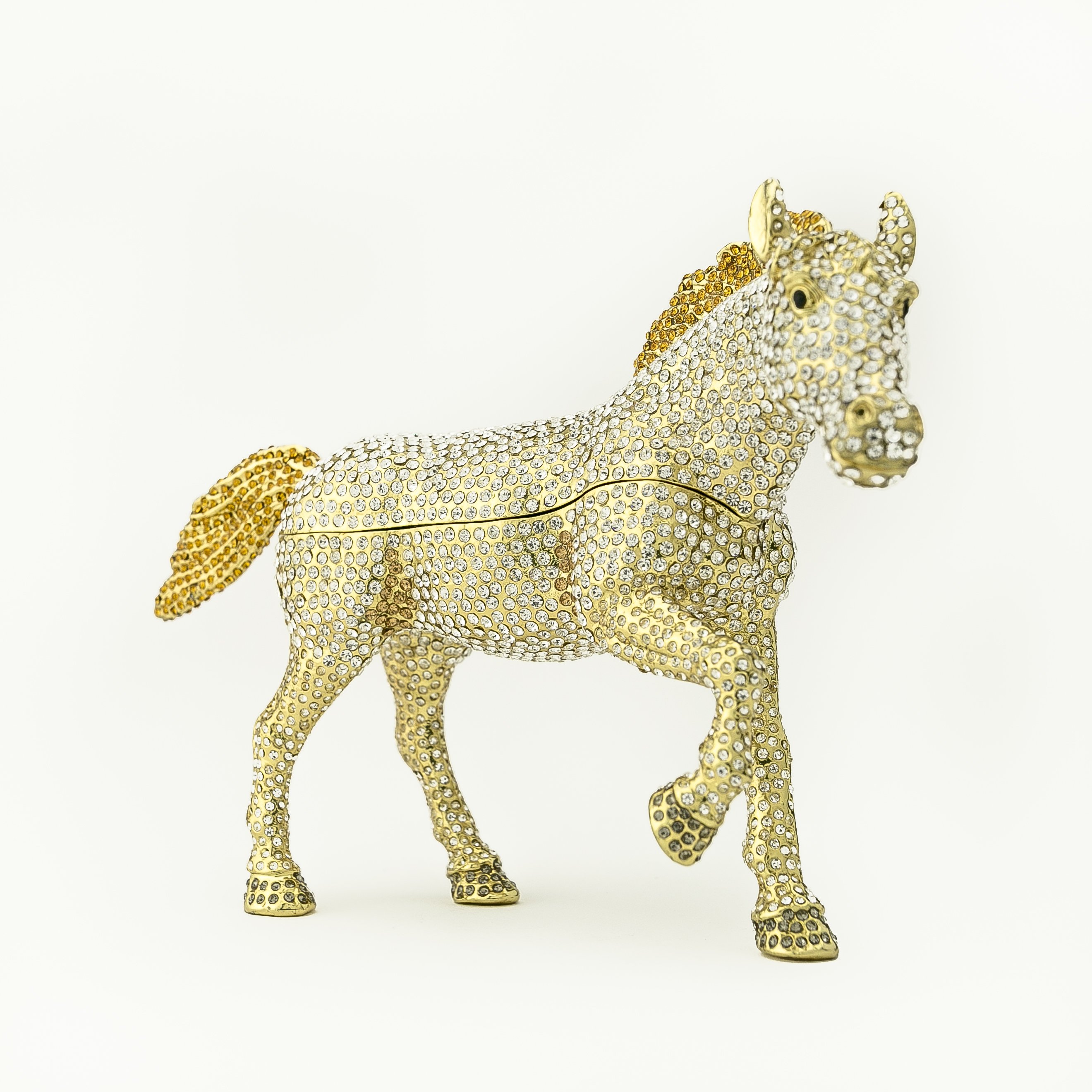 Large golden horse trinket box adorned with white Austrian crystals, showcasing intricate enamel painting and luxurious gold plating.