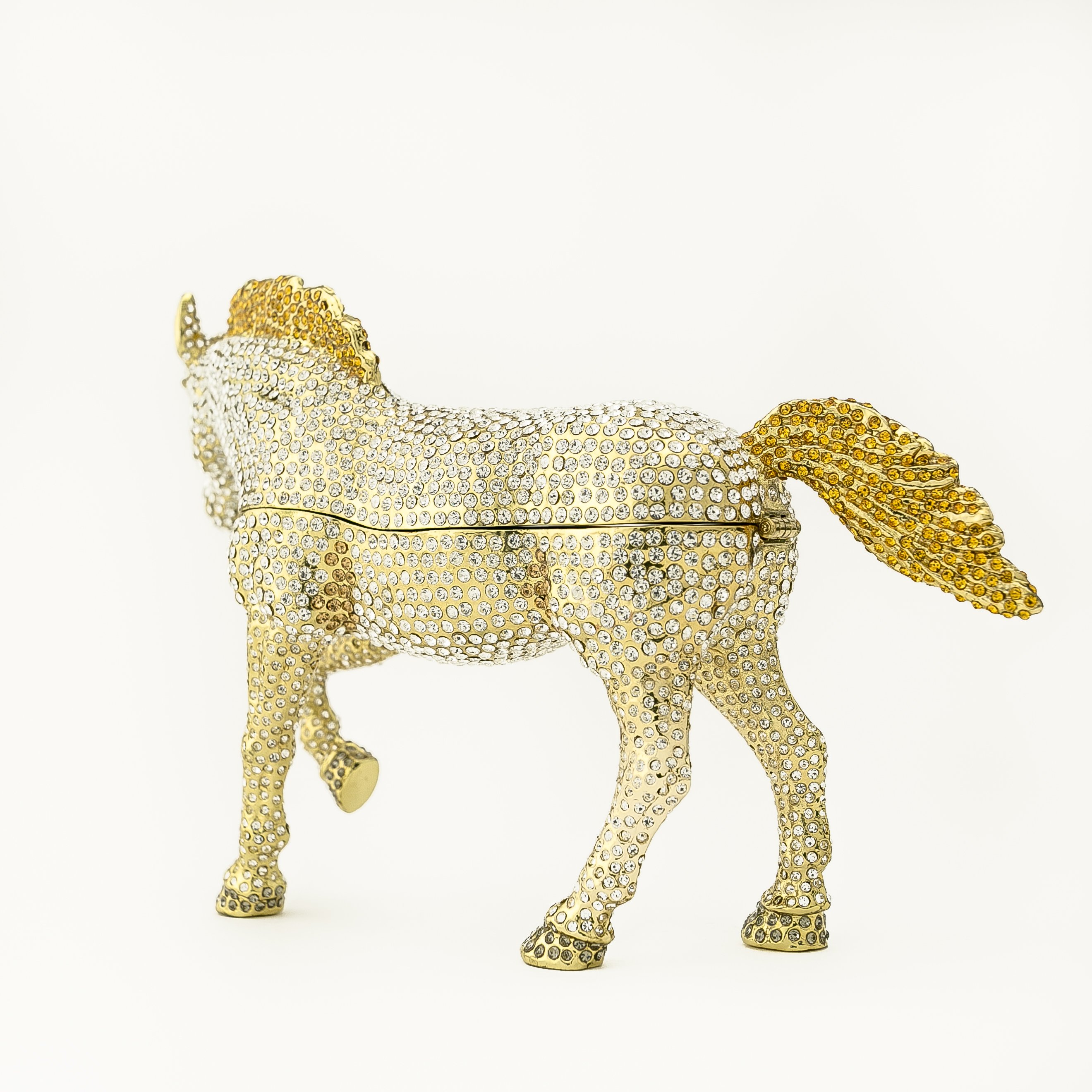 Large golden horse trinket box adorned with white Austrian crystals, showcasing intricate enamel painting and luxurious gold plating.