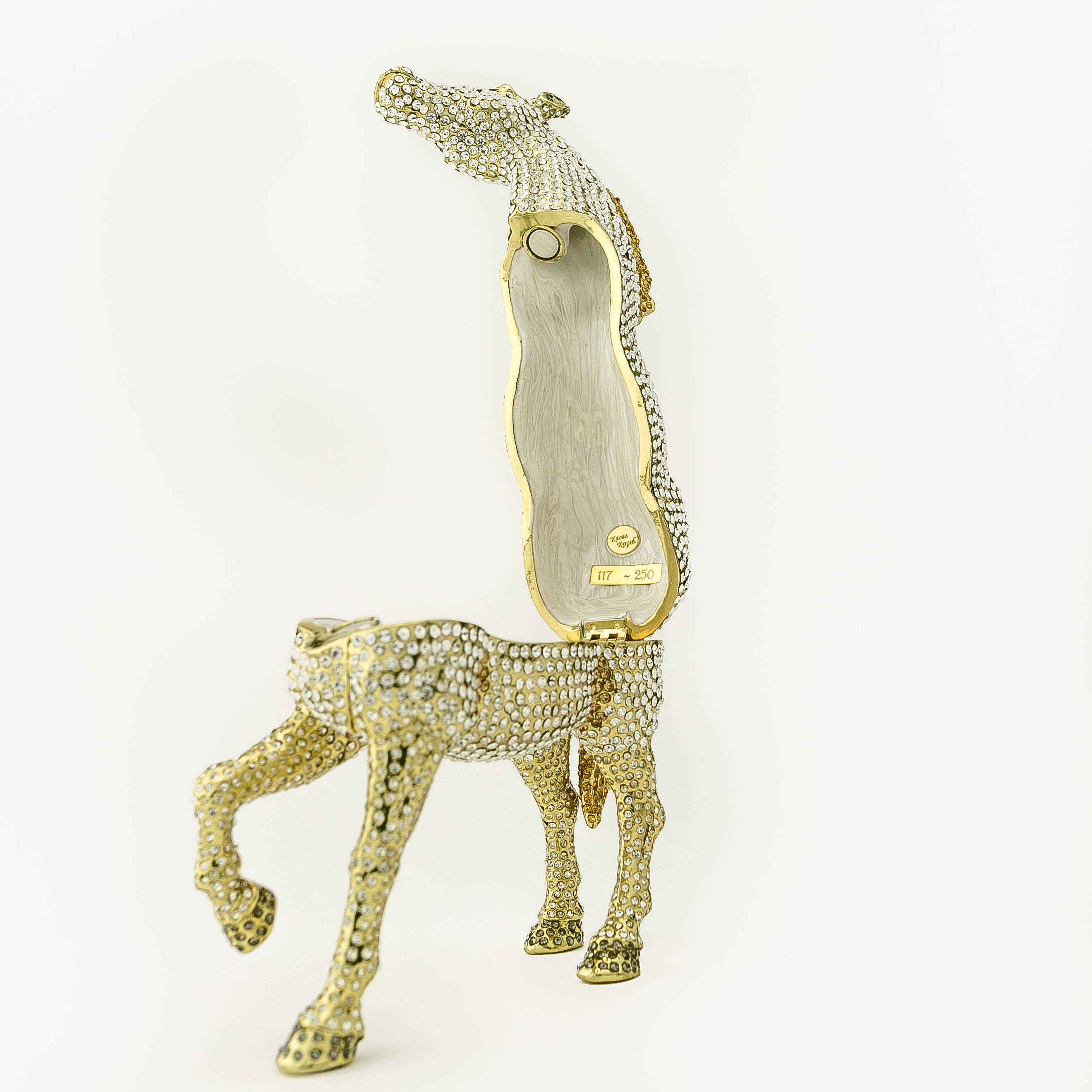 Large golden horse trinket box adorned with white Austrian crystals, showcasing intricate enamel painting and luxurious gold plating.