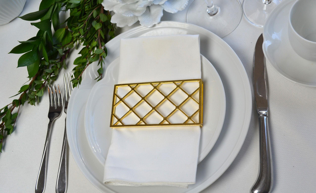 Large Trellis Napkin Wrap in Matte Gold showcasing an elegant trellis design, perfect for enhancing table settings.