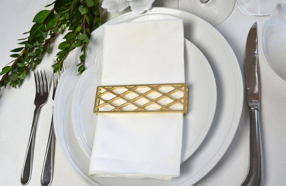 Large Trellis Napkin Wrap in Matte Gold showcasing an elegant trellis design, perfect for enhancing table settings.