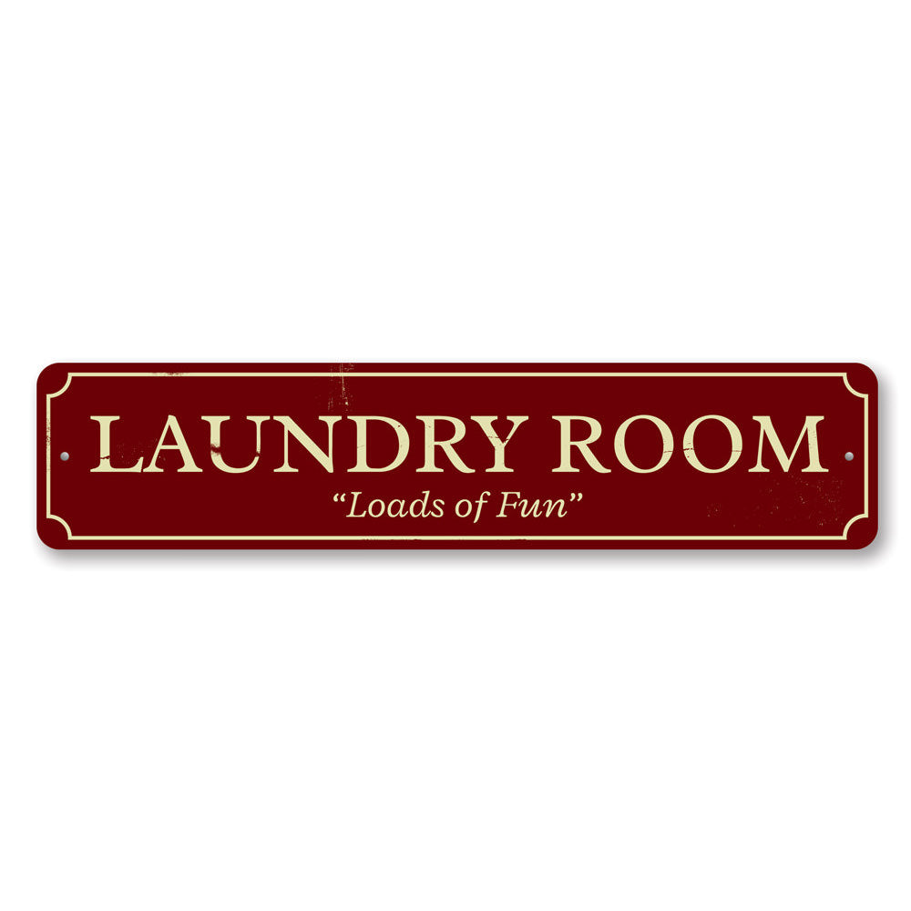 Laundry Room Loads of Fun Sign made of high-quality aluminum, featuring a playful design perfect for home decor.