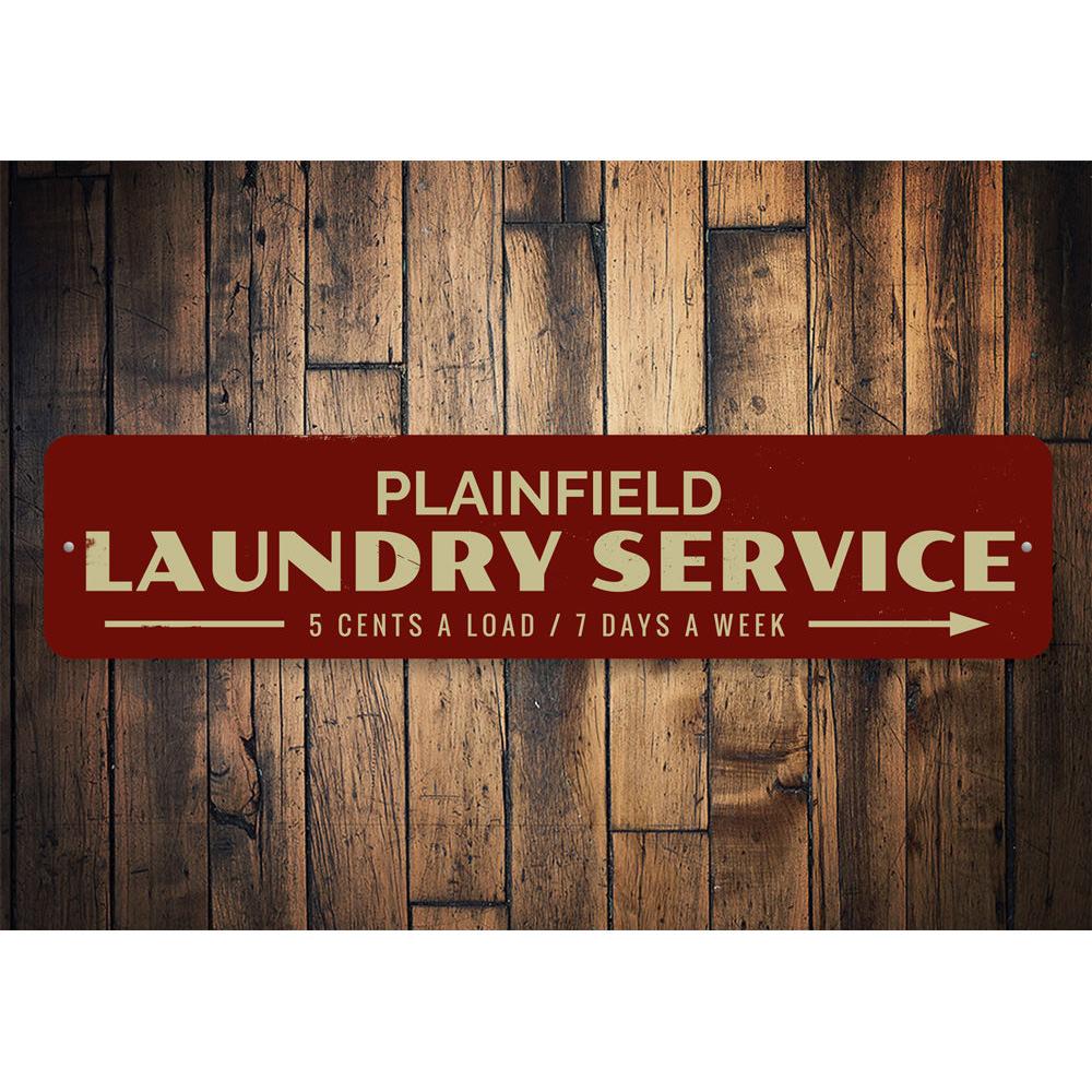 Laundry Service Arrow Sign made of durable aluminum, featuring customizable text and pre-drilled holes for easy mounting.