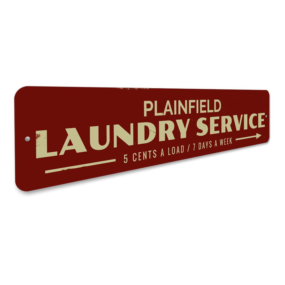 Laundry Service Arrow Sign made of durable aluminum, featuring customizable text and pre-drilled holes for easy mounting.