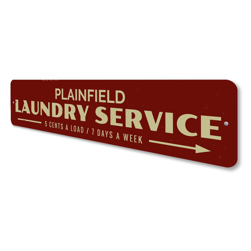 Laundry Service Arrow Sign made of durable aluminum, featuring customizable text and pre-drilled holes for easy mounting.