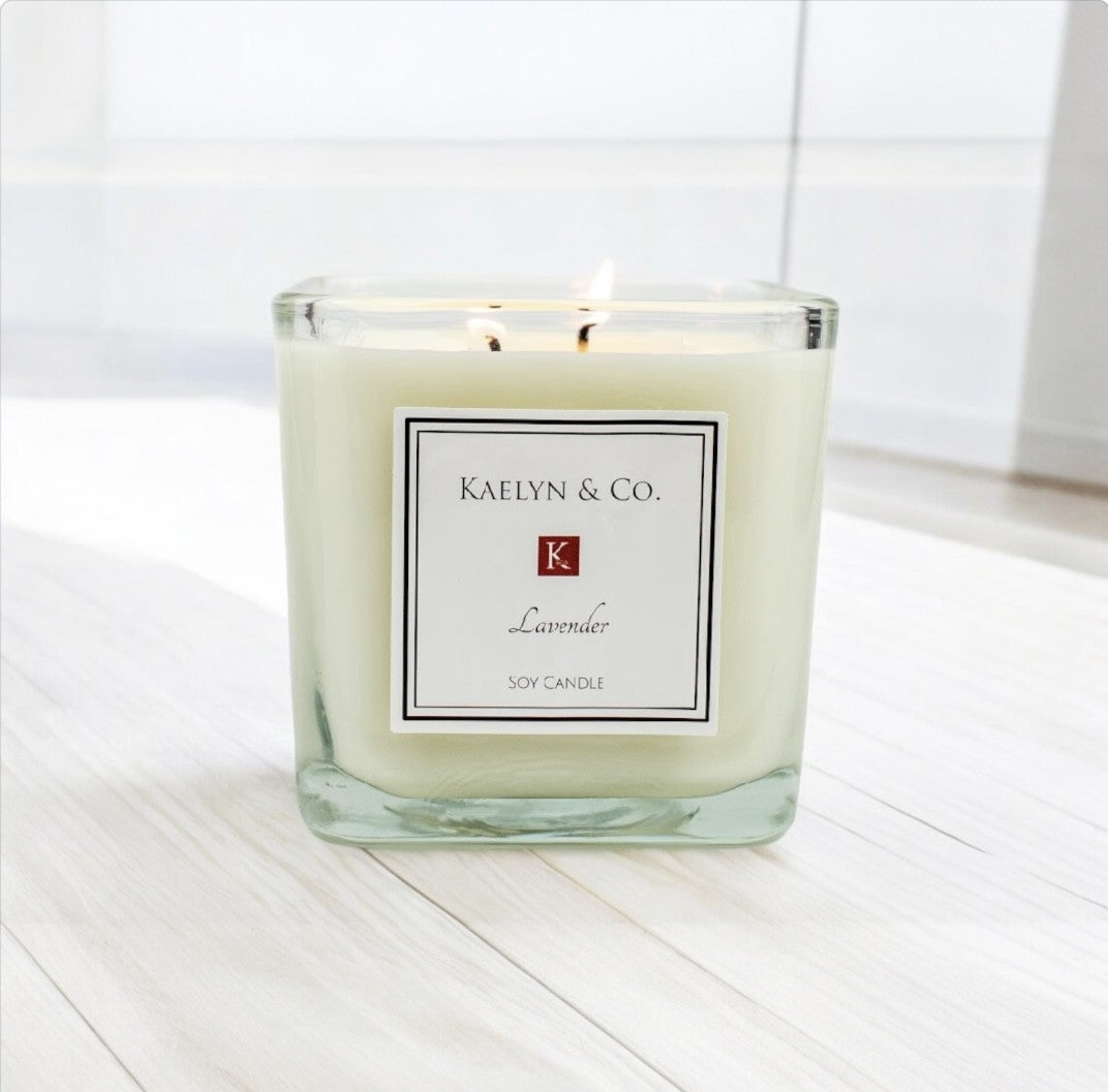 Lavender Medium Cube Candle in a stylish cube shape, showcasing its elegant design and soothing lavender color.