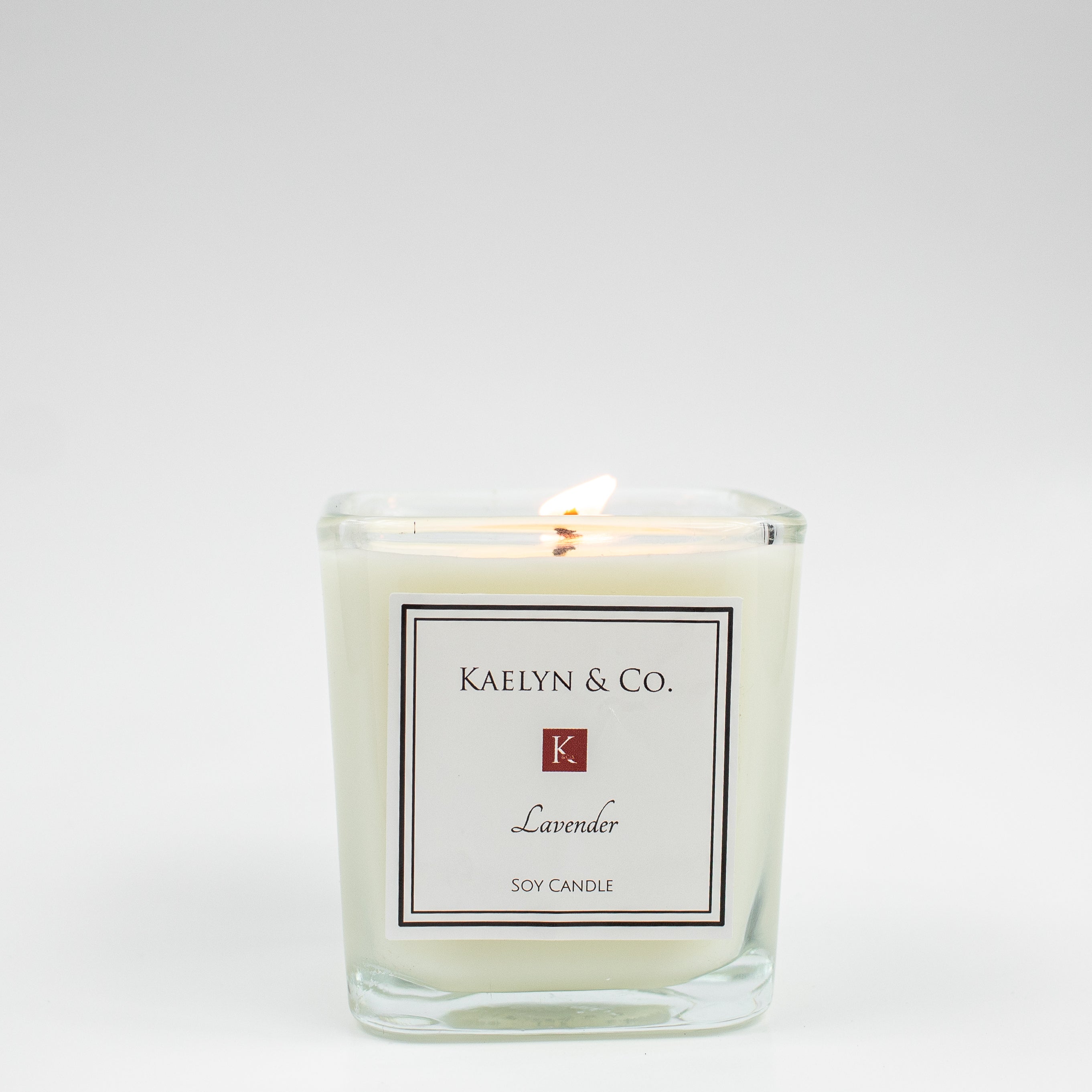 Lavender Small Cube Candle in a stylish cube shape, showcasing its floral lavender color and elegant design.