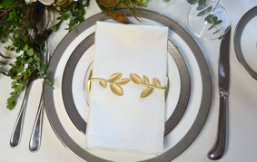 Elegant Leaf Wrap Matte Gold napkin rings with a unique leaf design, perfect for enhancing table decor.