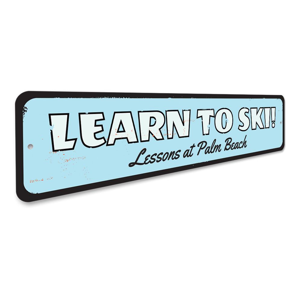 Customizable Learn To Ski Sign made from high-quality aluminum, featuring pre-drilled holes for easy mounting.