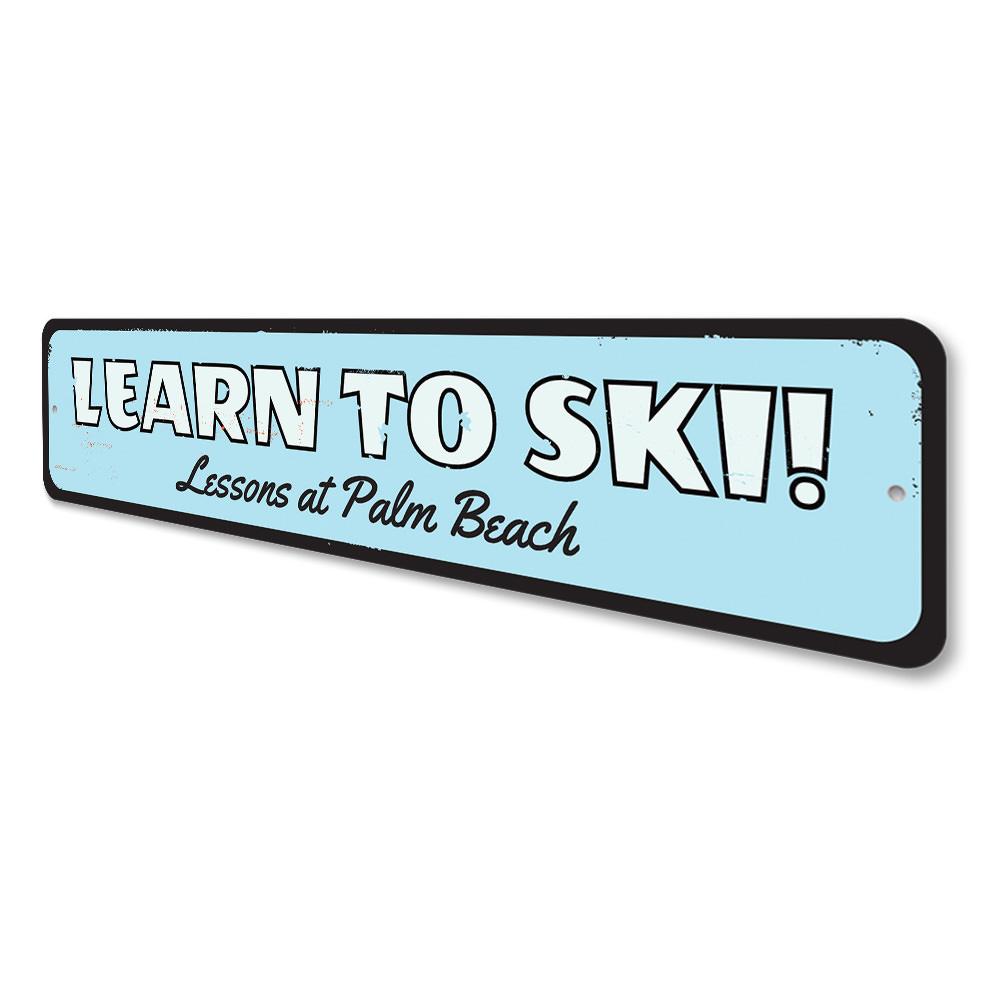 Customizable Learn To Ski Sign made from high-quality aluminum, featuring pre-drilled holes for easy mounting.