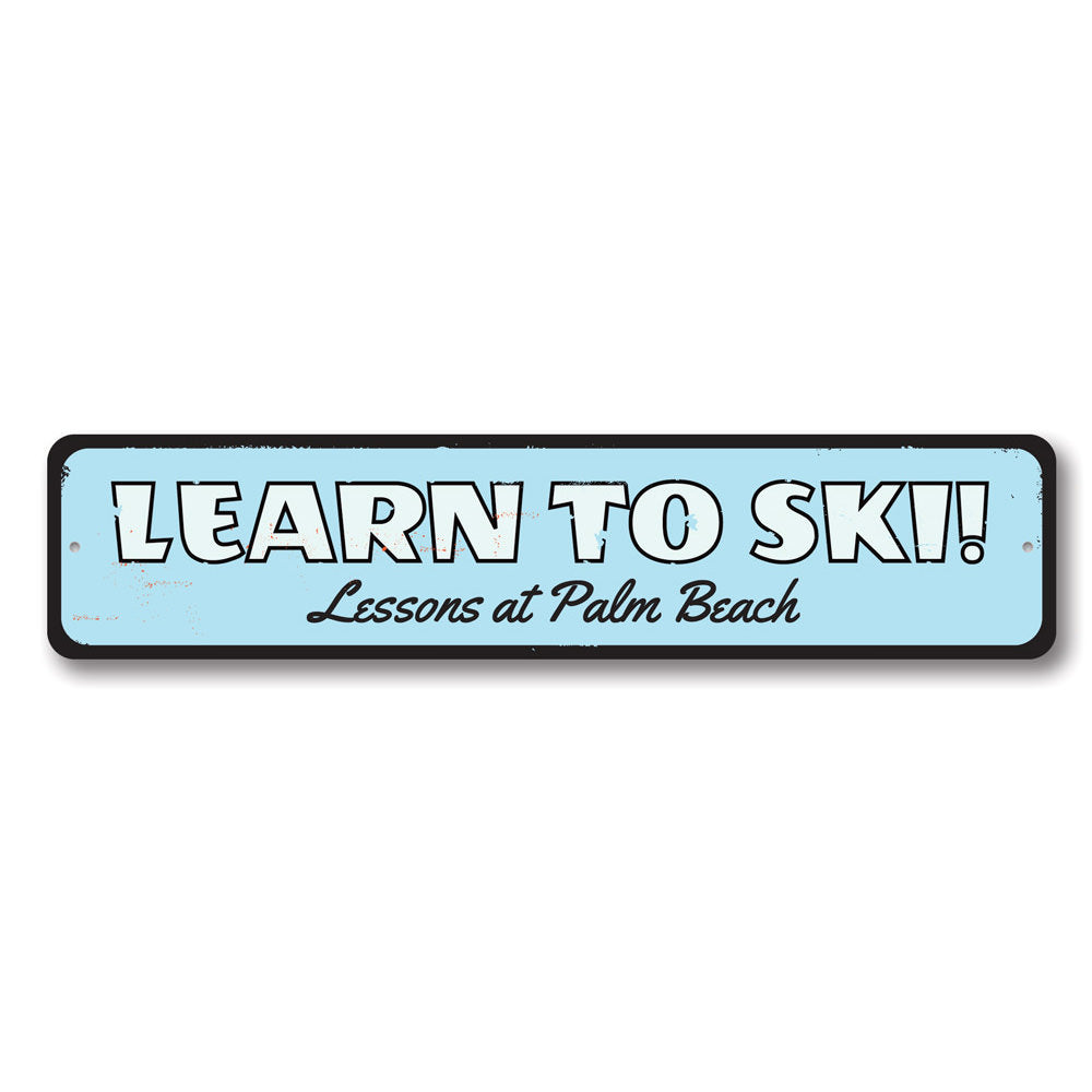 Customizable Learn To Ski Sign made from high-quality aluminum, featuring pre-drilled holes for easy mounting.