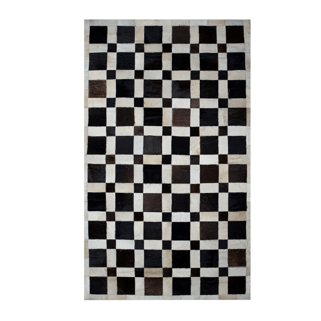 Handmade cowhide leather rug featuring a unique square patchwork design, showcasing natural textures and colors.