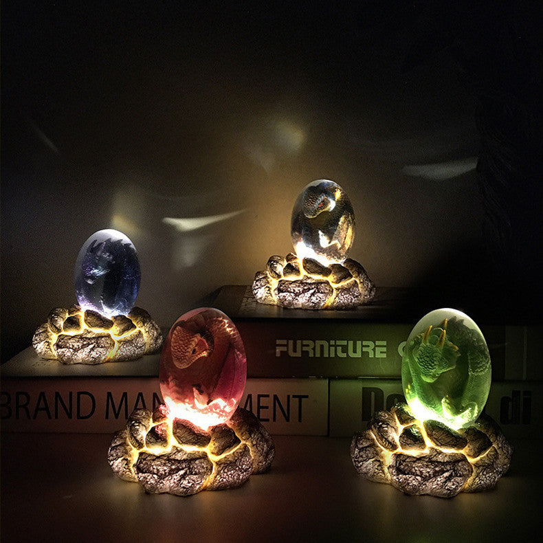 LED Lava Dragon Egg ornamental decor featuring a transparent design with a lava dragon inside, crafted from high-quality synthetic resin.