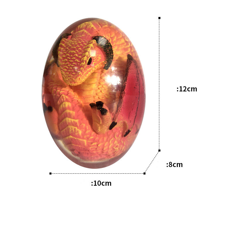 LED Lava Dragon Egg ornamental decor featuring a transparent design with a lava dragon inside, crafted from high-quality synthetic resin.