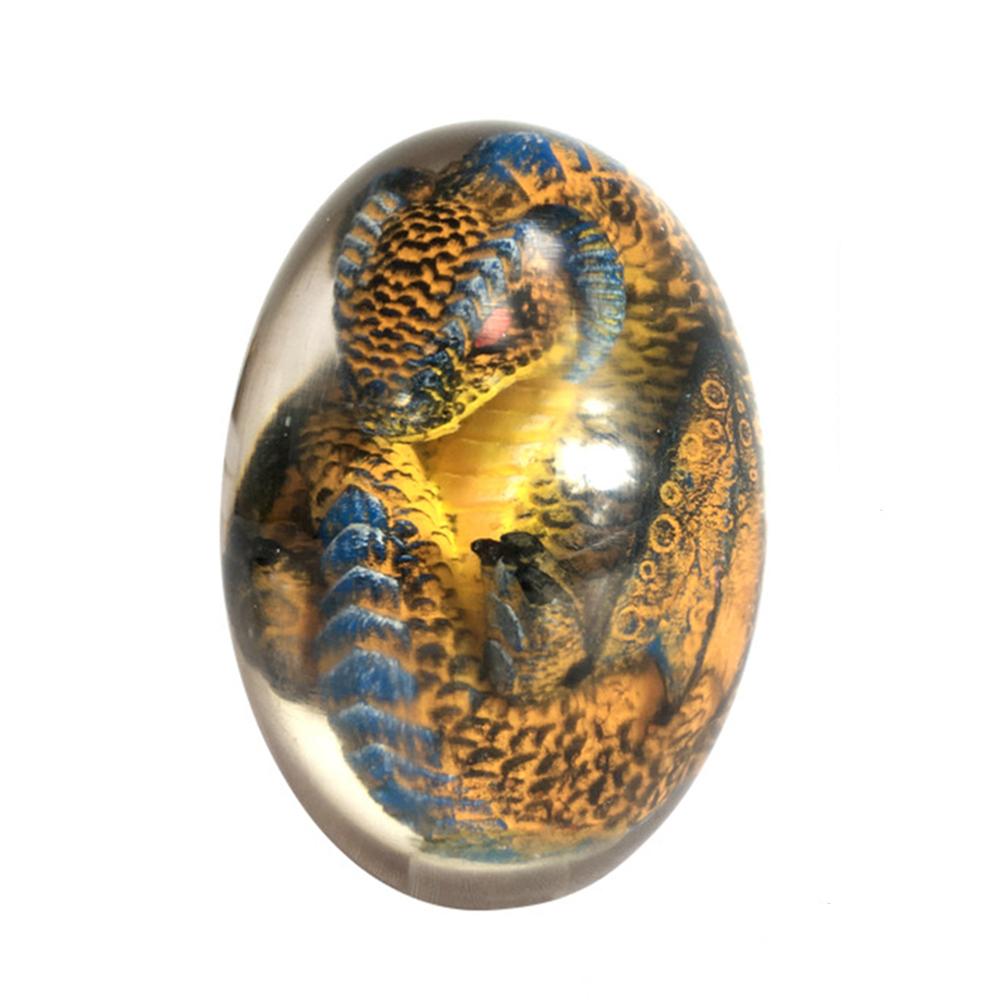 LED Lava Dragon Egg ornamental decor featuring a transparent design with a lava dragon inside, crafted from high-quality synthetic resin.