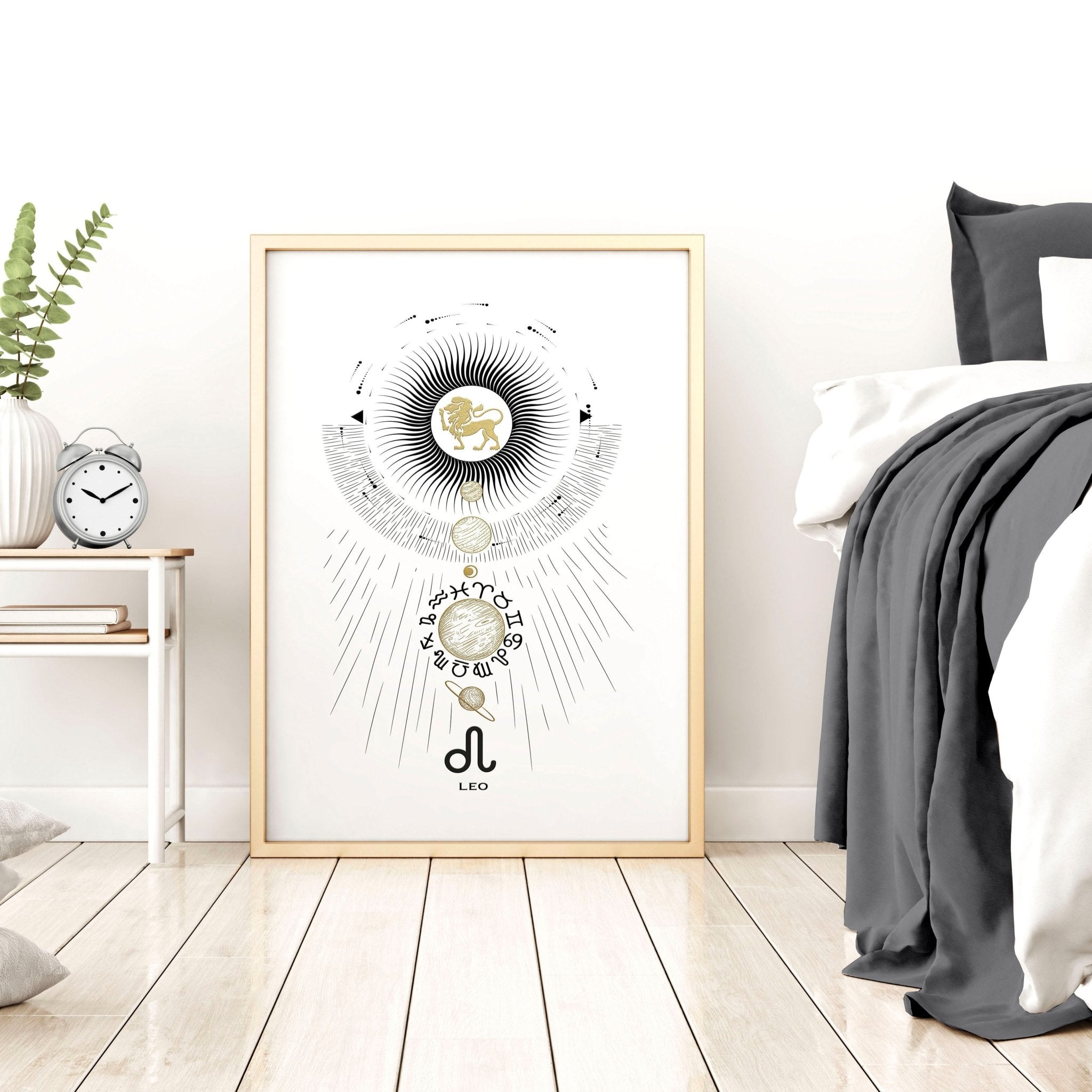 A stylish Leo zodiac sign wall art print featuring a black, white, and gold design, perfect for home decor.