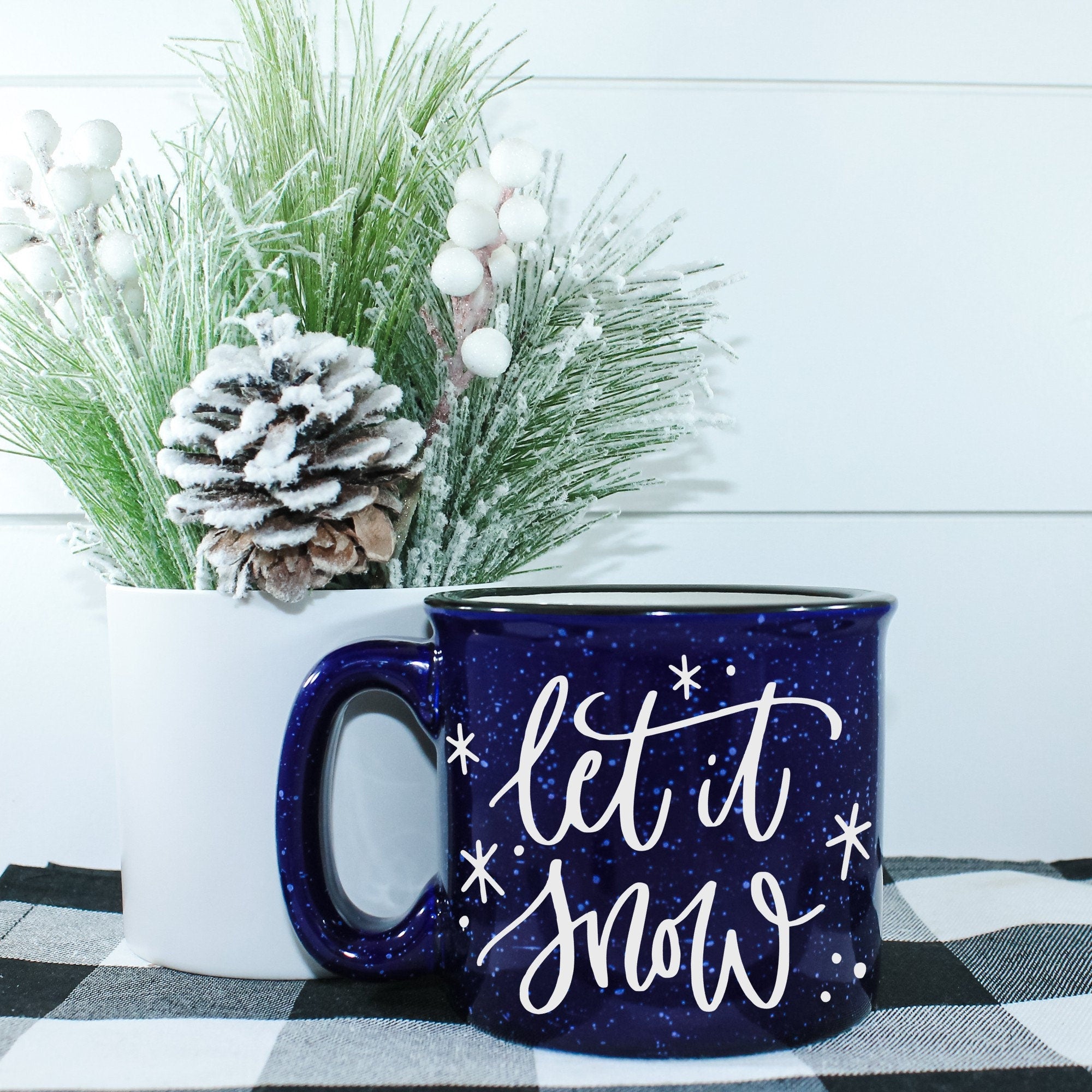 Let It Snow Campfire Mug with a winter-themed design, perfect for cozy beverages.