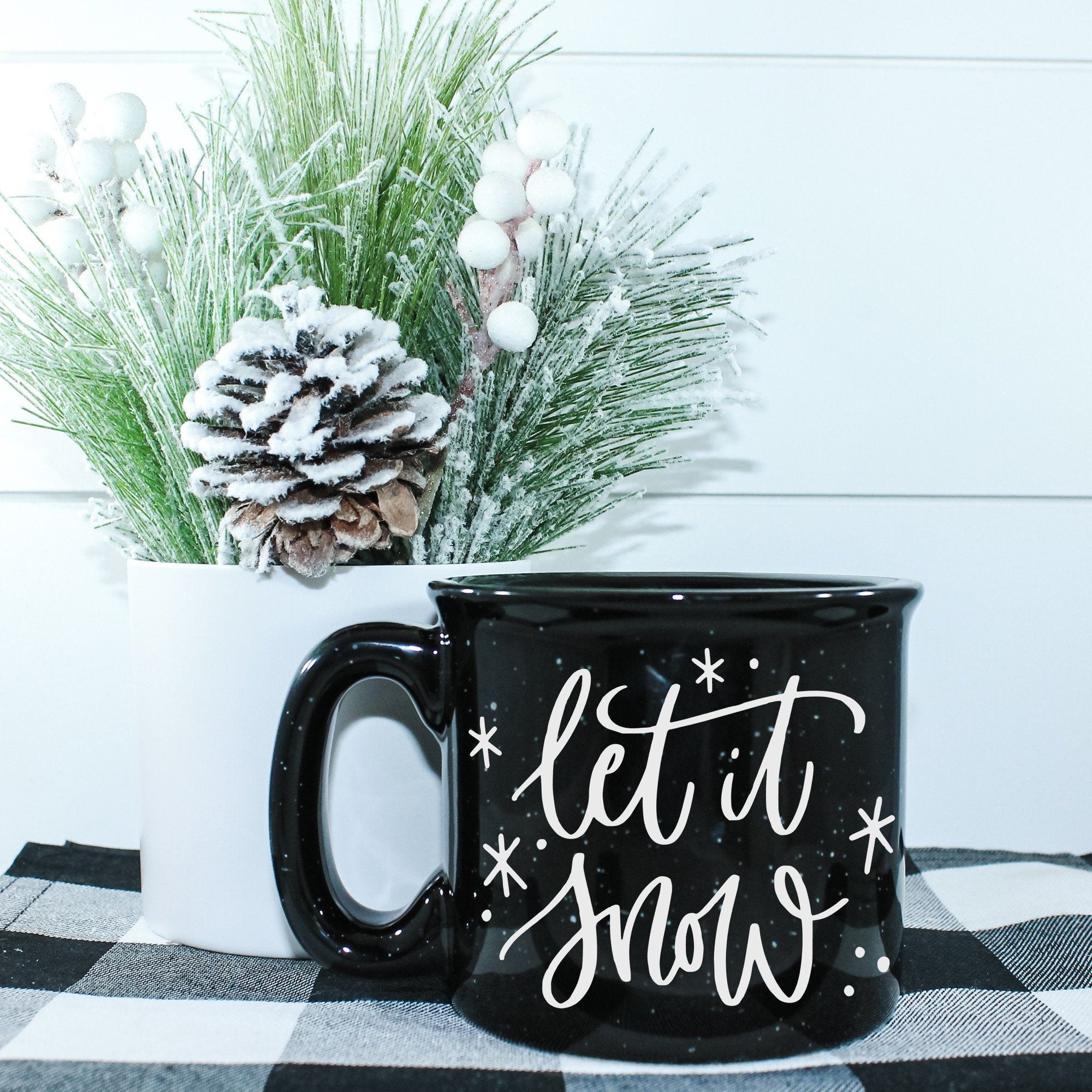 Let It Snow Campfire Mug with a winter-themed design, perfect for cozy beverages.